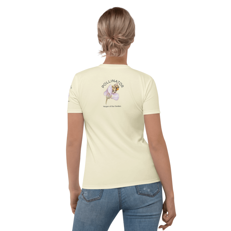 Woman wearing a light yellow t-shirt with a bee and flower graphic design on the back