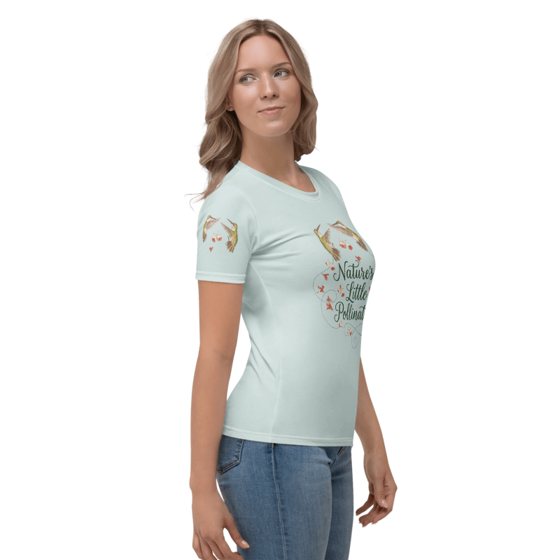 right sideview of Woman wearing a light blue t-shirt with a graphic of hummingbirds and text "Nature's Little Pollinators"