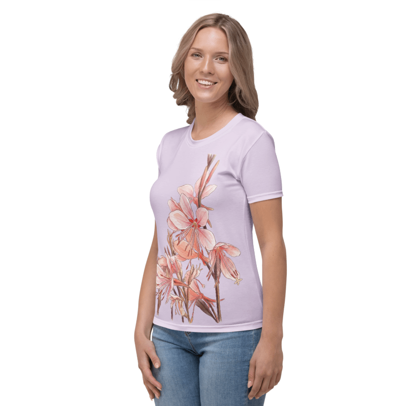 Left view of Woman wearing a light Lavender t-shirt with floral design 