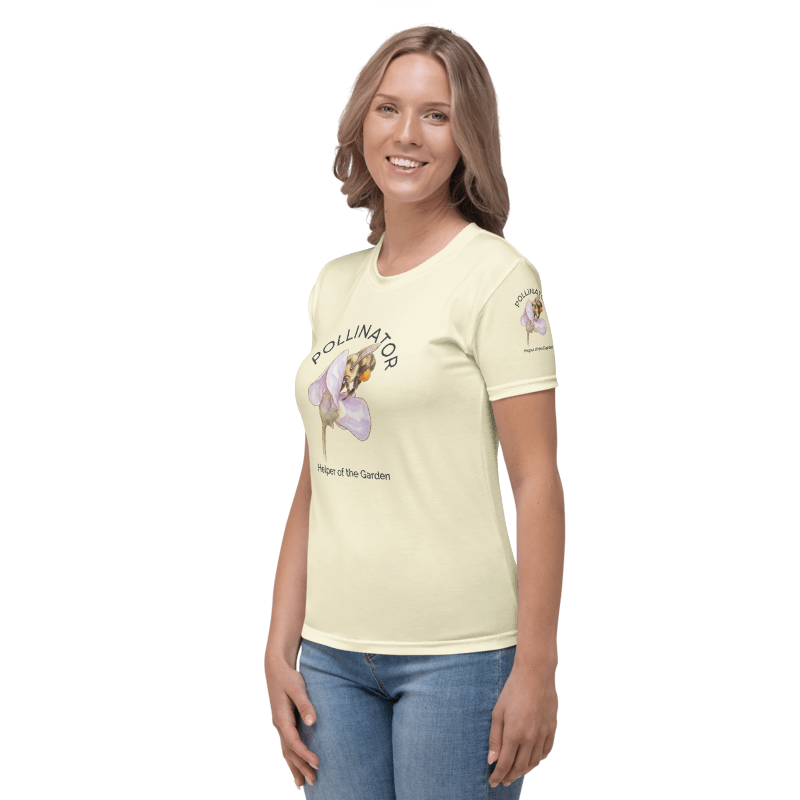 Woman wearing a light yellow-colored t-shirt with a bee and flower graphic design 