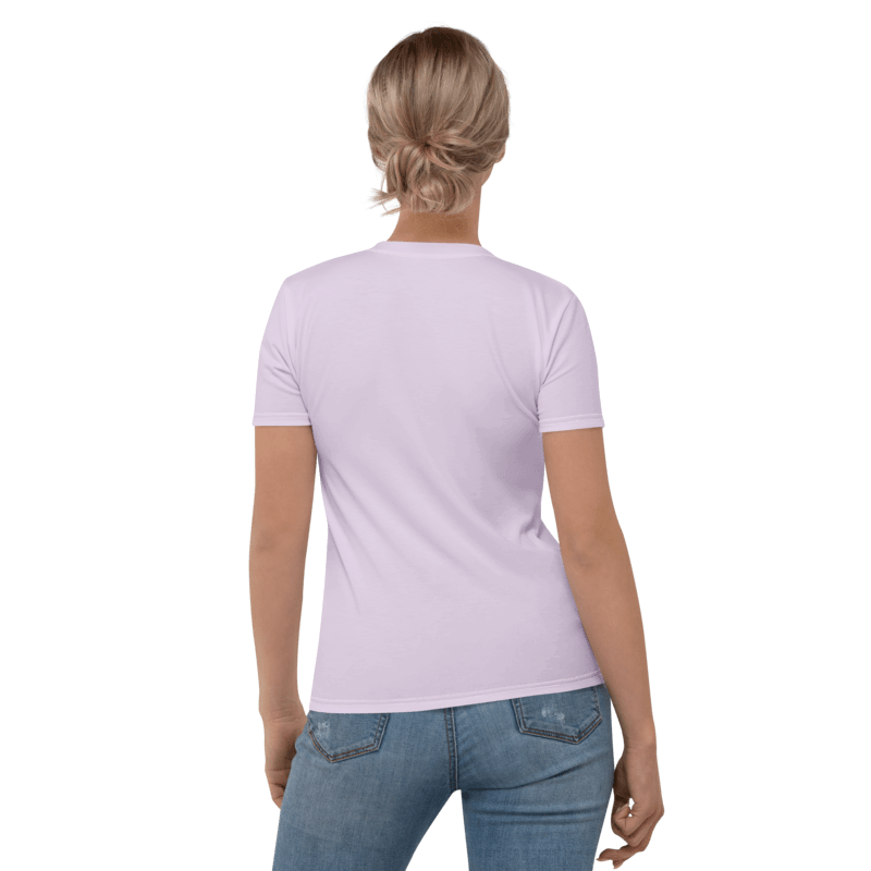 Back view of Woman wearing a light Lavender t-shirt with floral design on the front