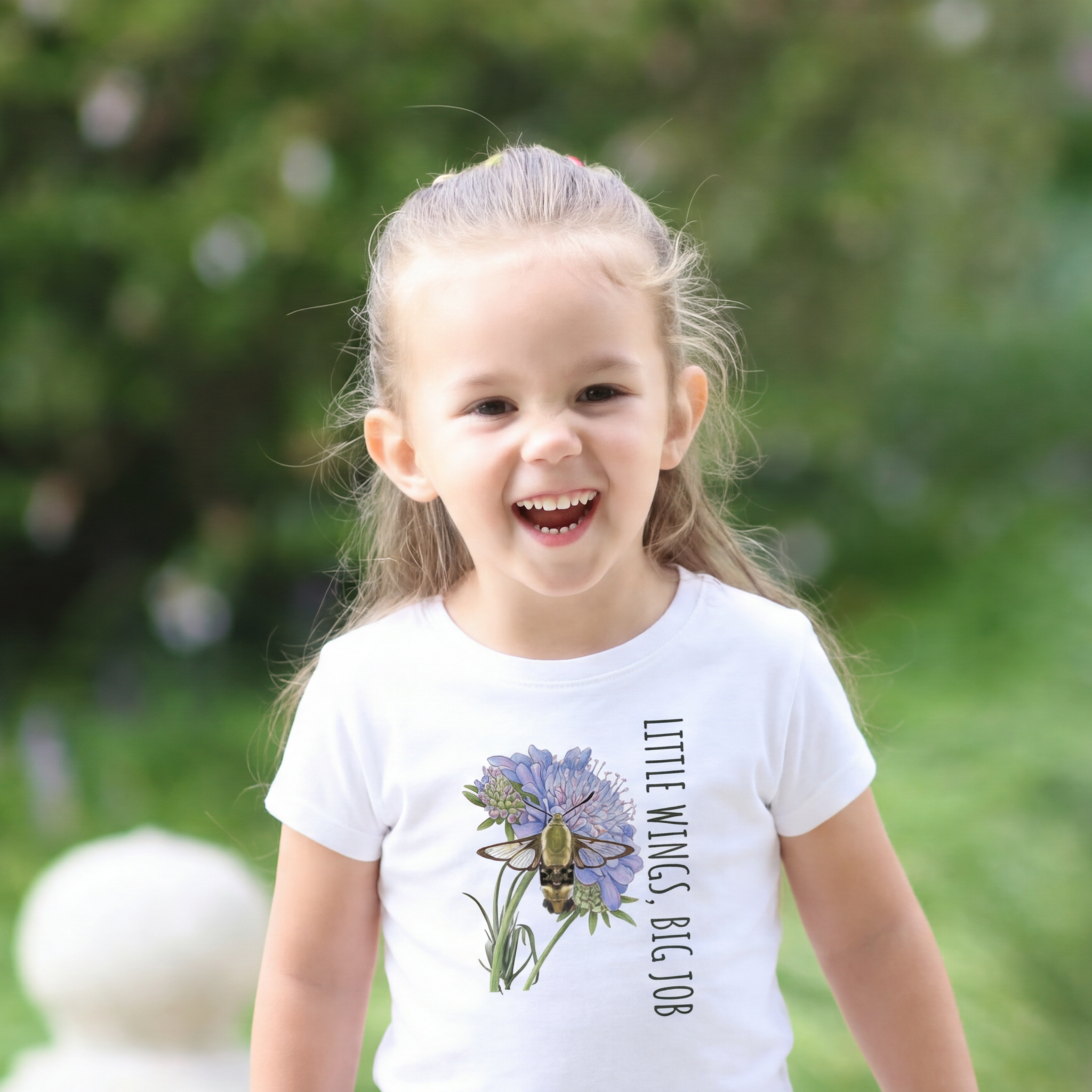 “Little Wings Big Job hummingbird illustration on a white toddler t-shirt, hand-painted style for nature-loving kids.”