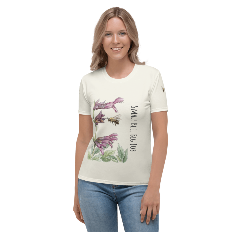 Woman wearing a  t-shirt with floral  and Bee design and text "Small Bee, Big Job"