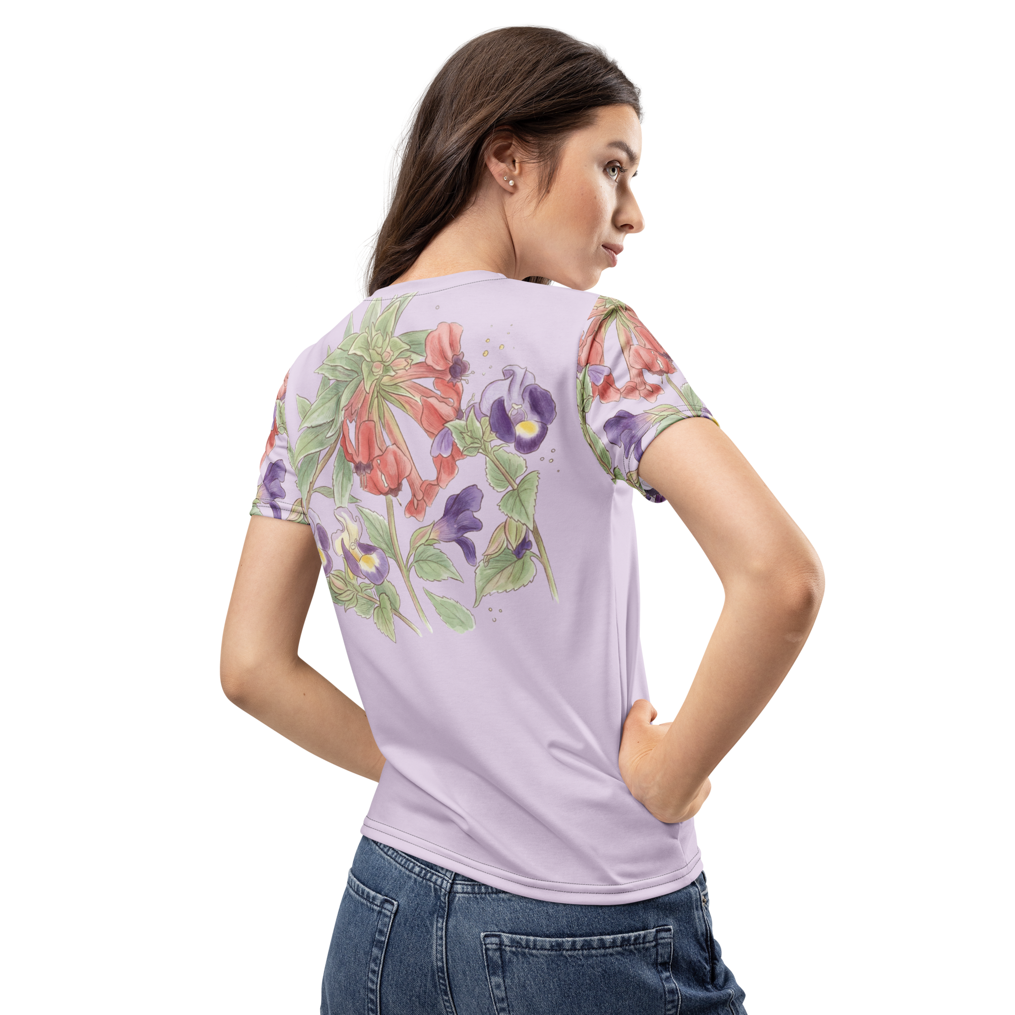 Woman wearing a light purple t-shirt with floral designs on a lavender background