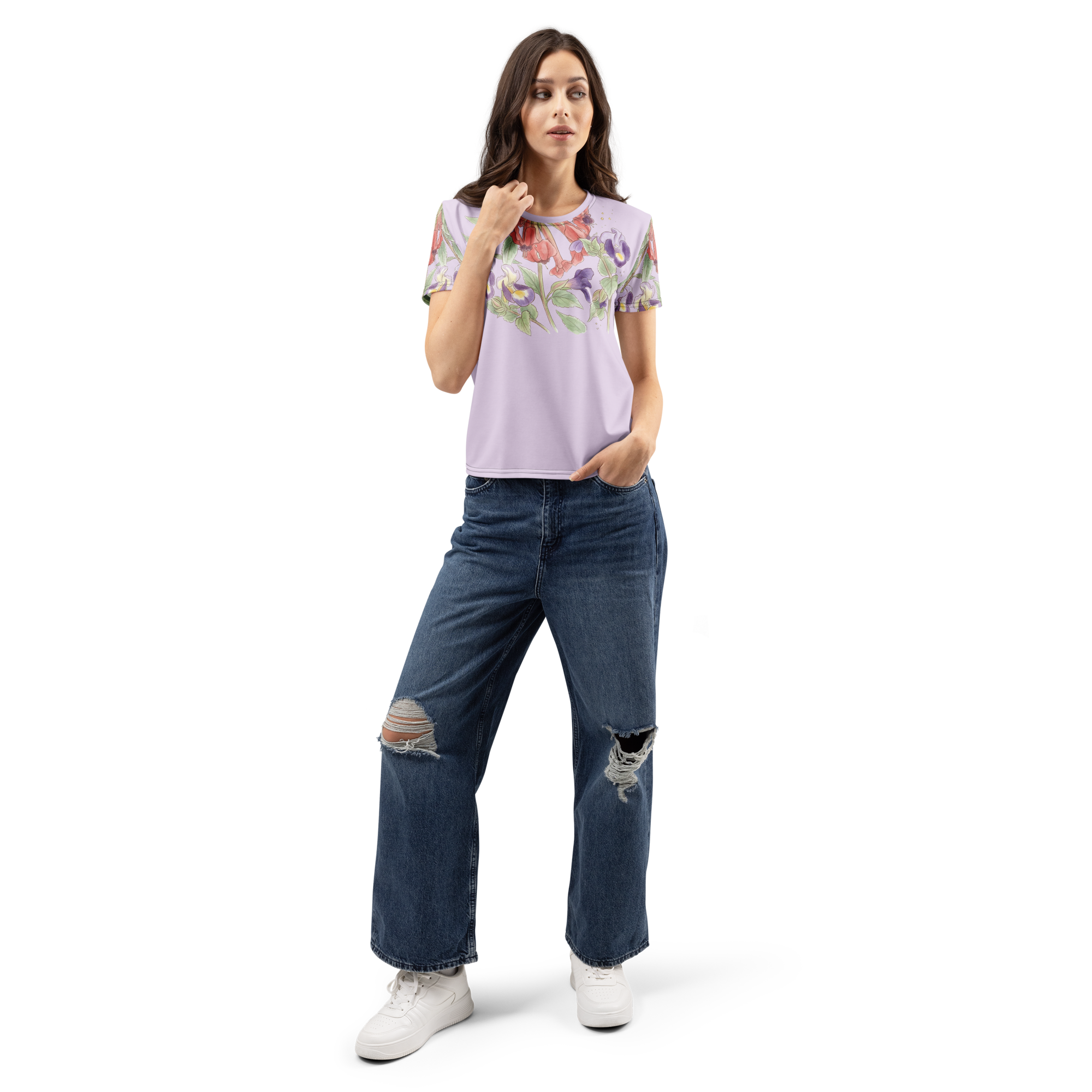 Woman wearing a floral t-shirt and ripped jeans 