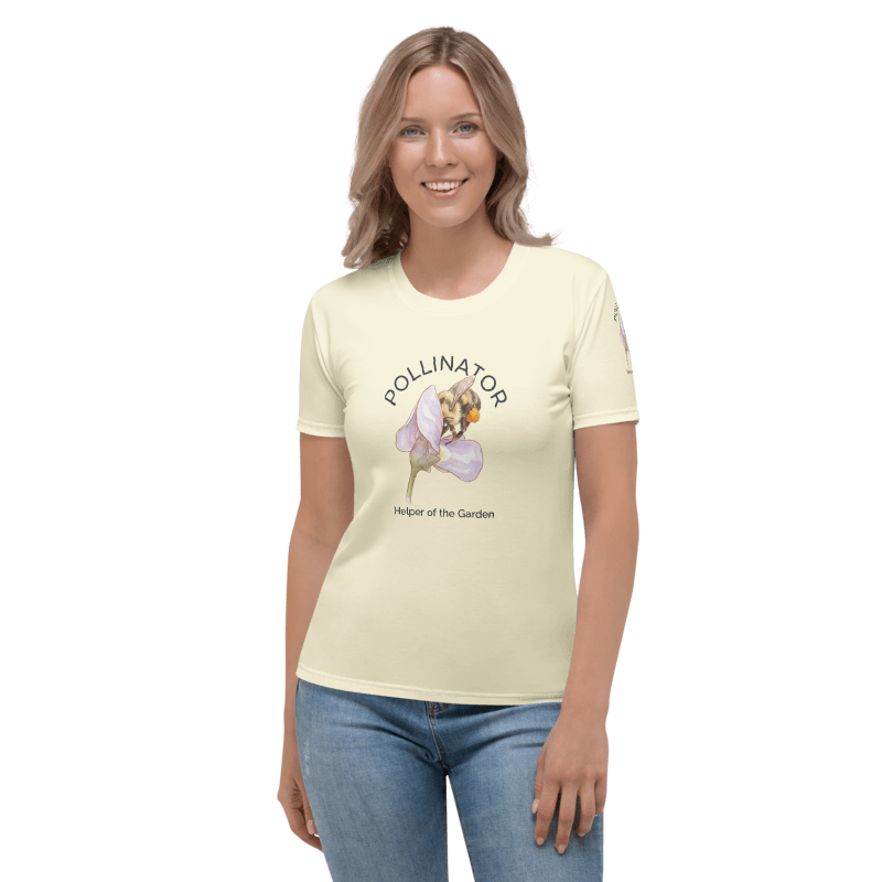 Woman wearing a light yellow t-shirt with a Bee and floral graphic design 