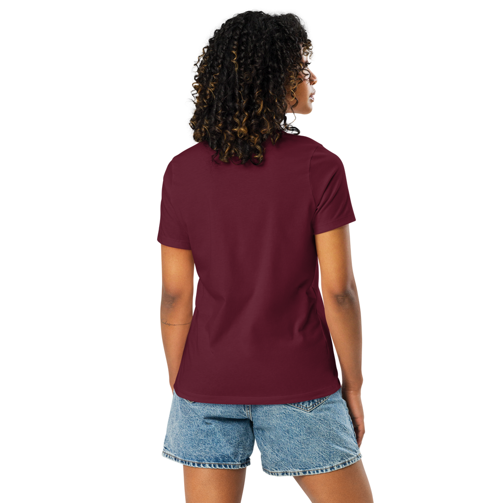 Person wearing a maroon t-shirt and denim shorts on a white background