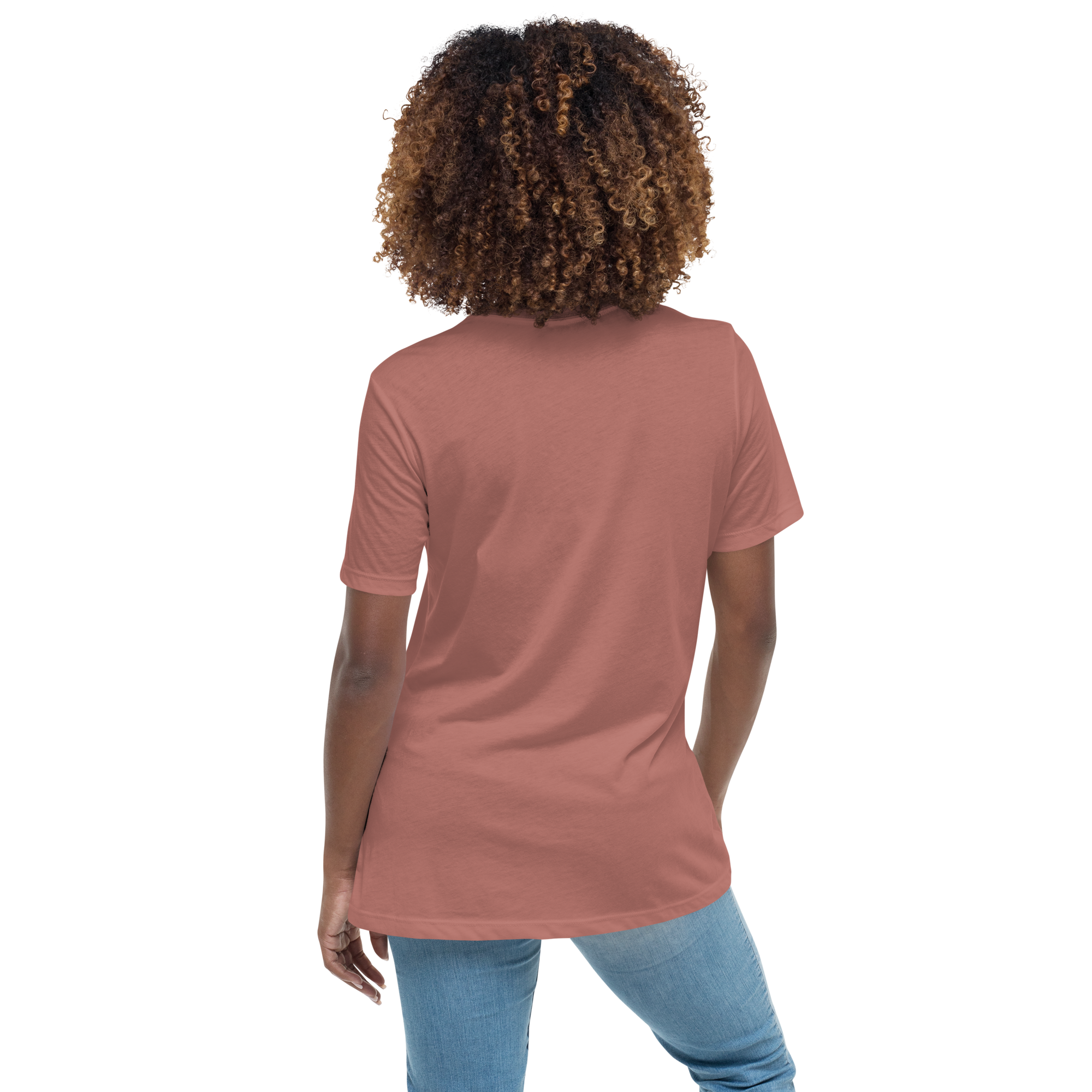 Person wearing a mauve t-shirt and blue jeans 