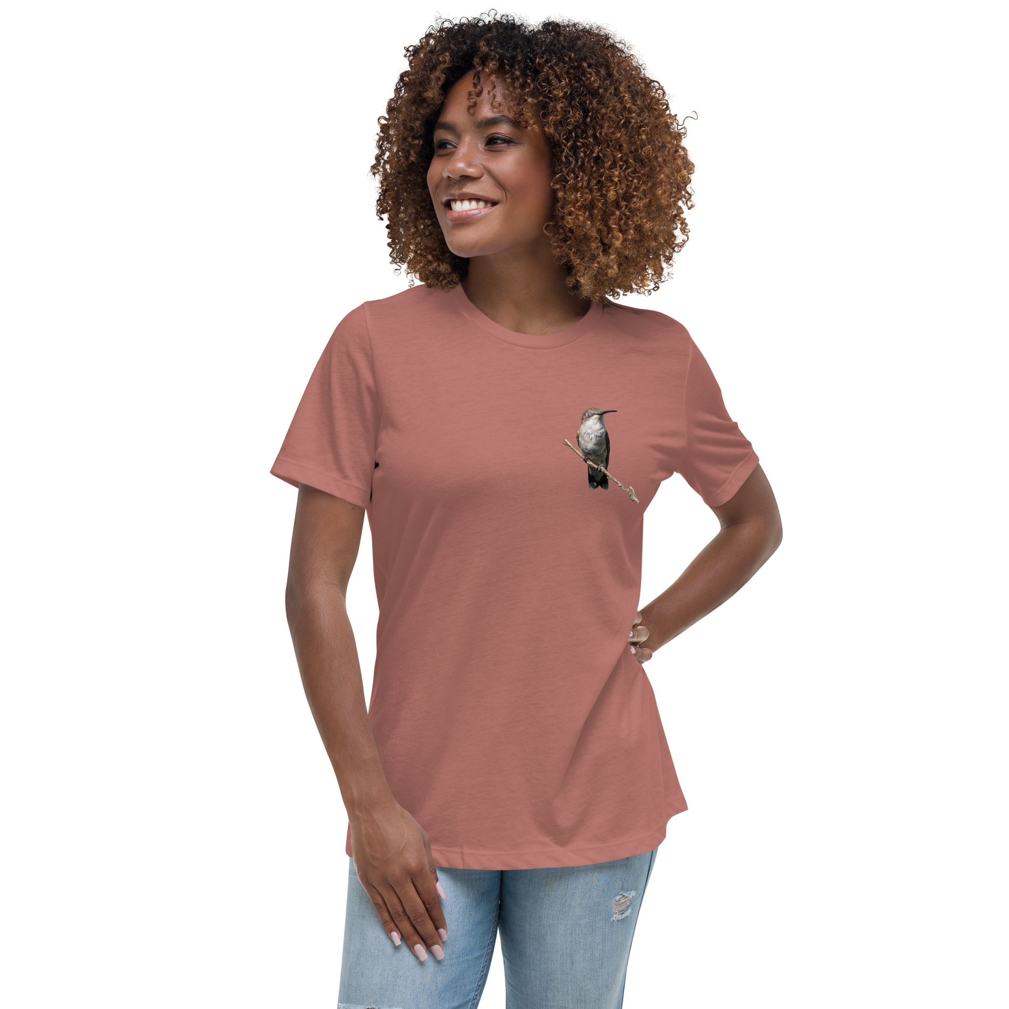 Woman wearing a mauve t-shirt with a hummingbird photo on a branch