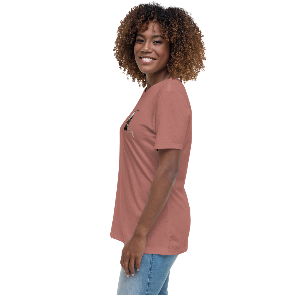 side view of Woman wearing a mauve t-shirt with a hummingbird photo on a branch