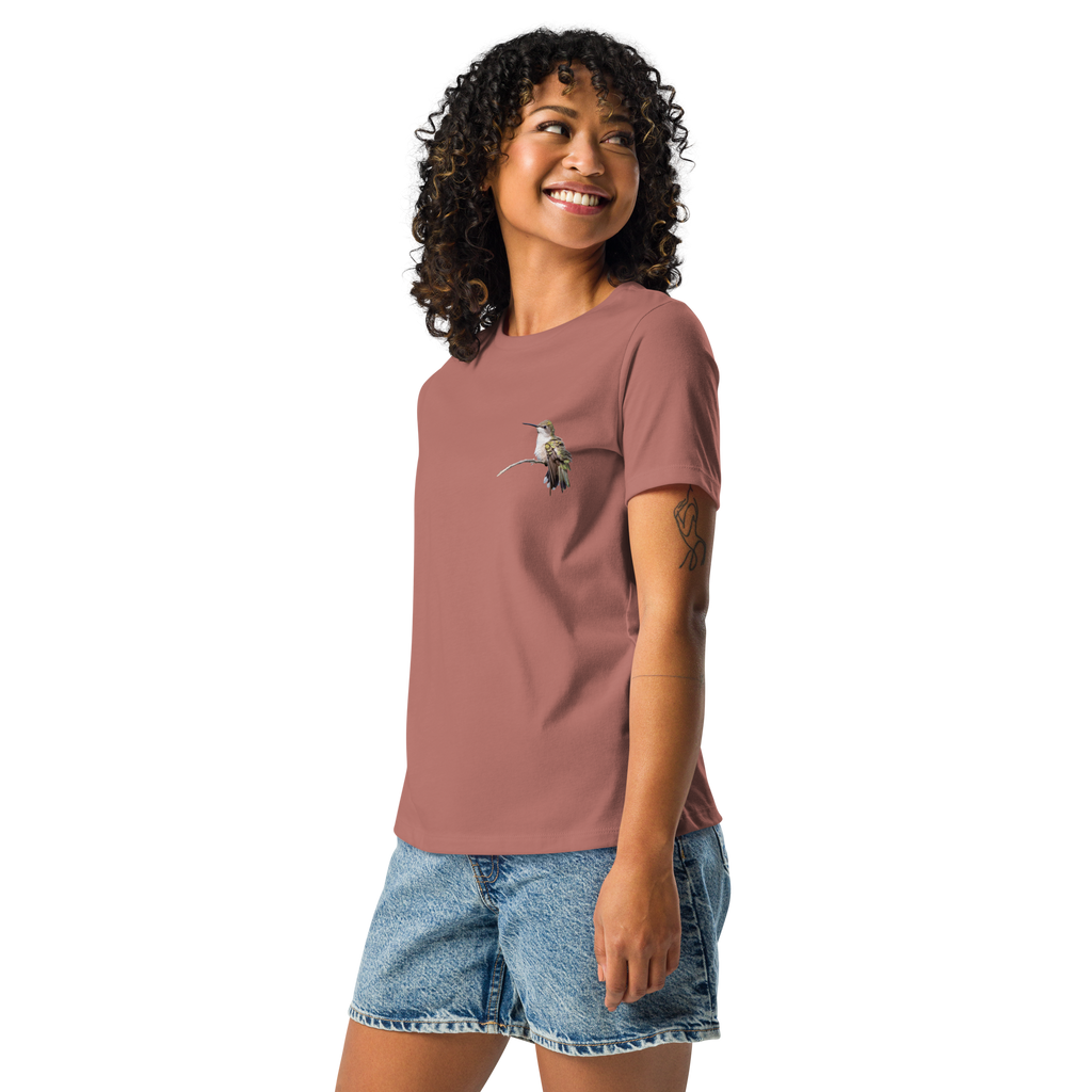Left view Woman wearing mauve tee shirt with photo of a hummingbird on a branch