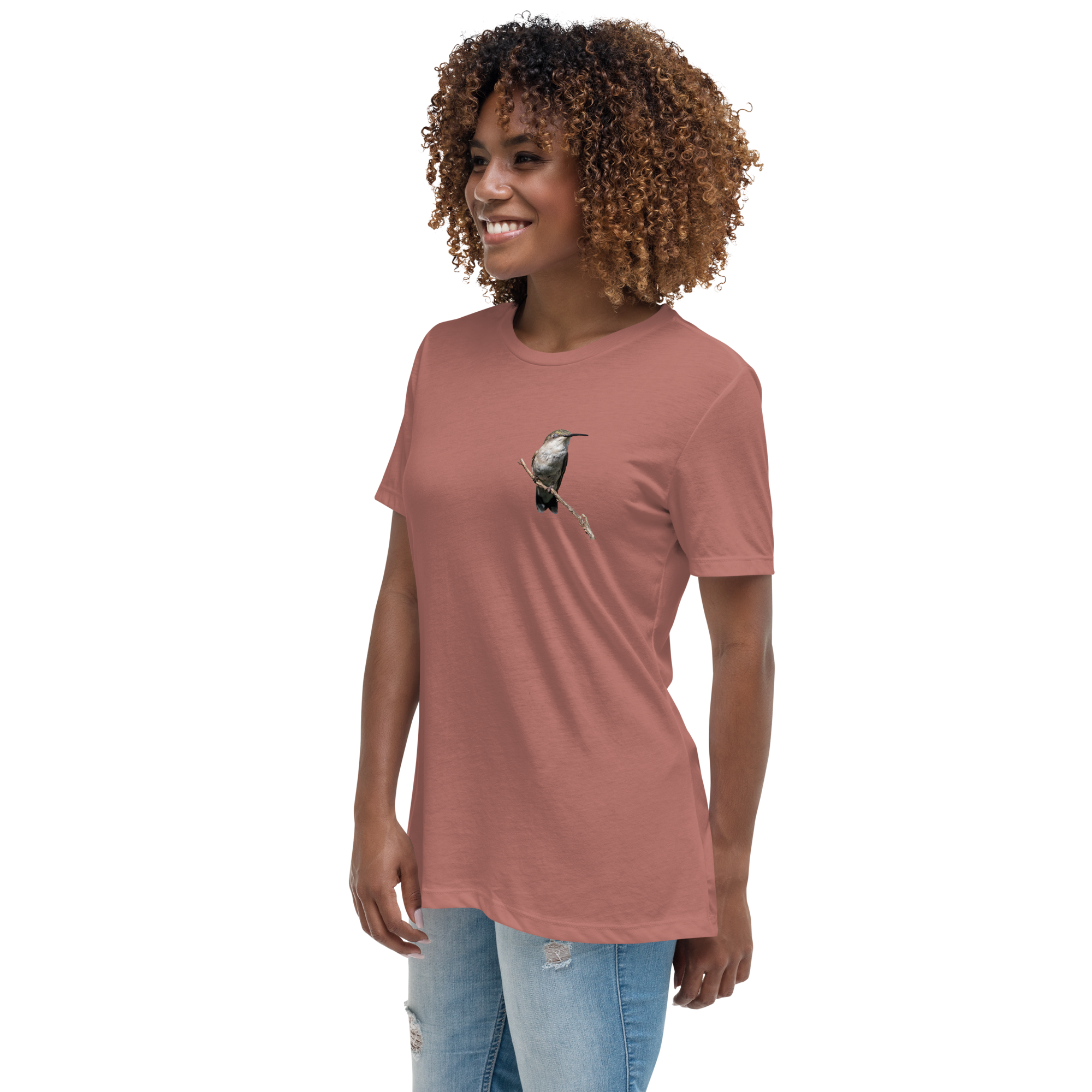 left view of Woman wearing a mauve t-shirt with a hummingbird photo on a branch