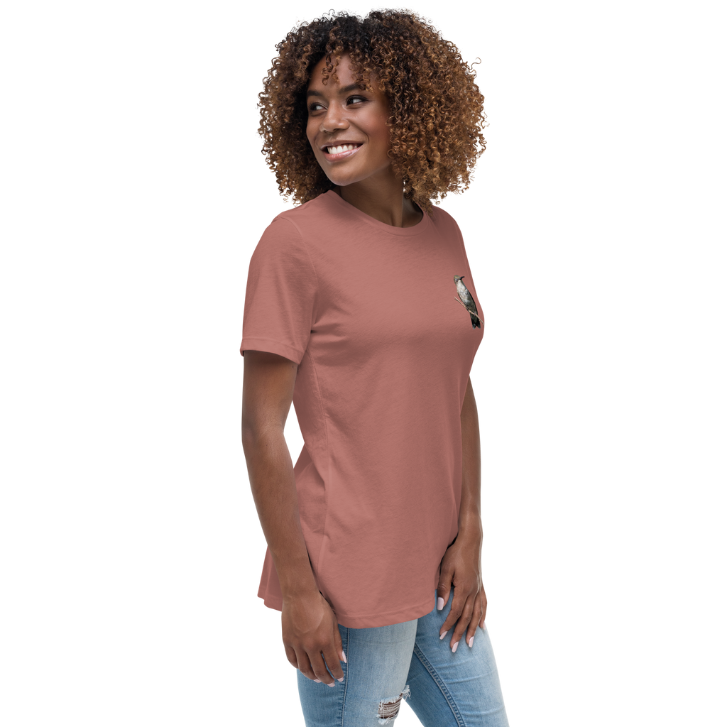 right view of Woman wearing a mauve t-shirt with a hummingbird photo on a branch
