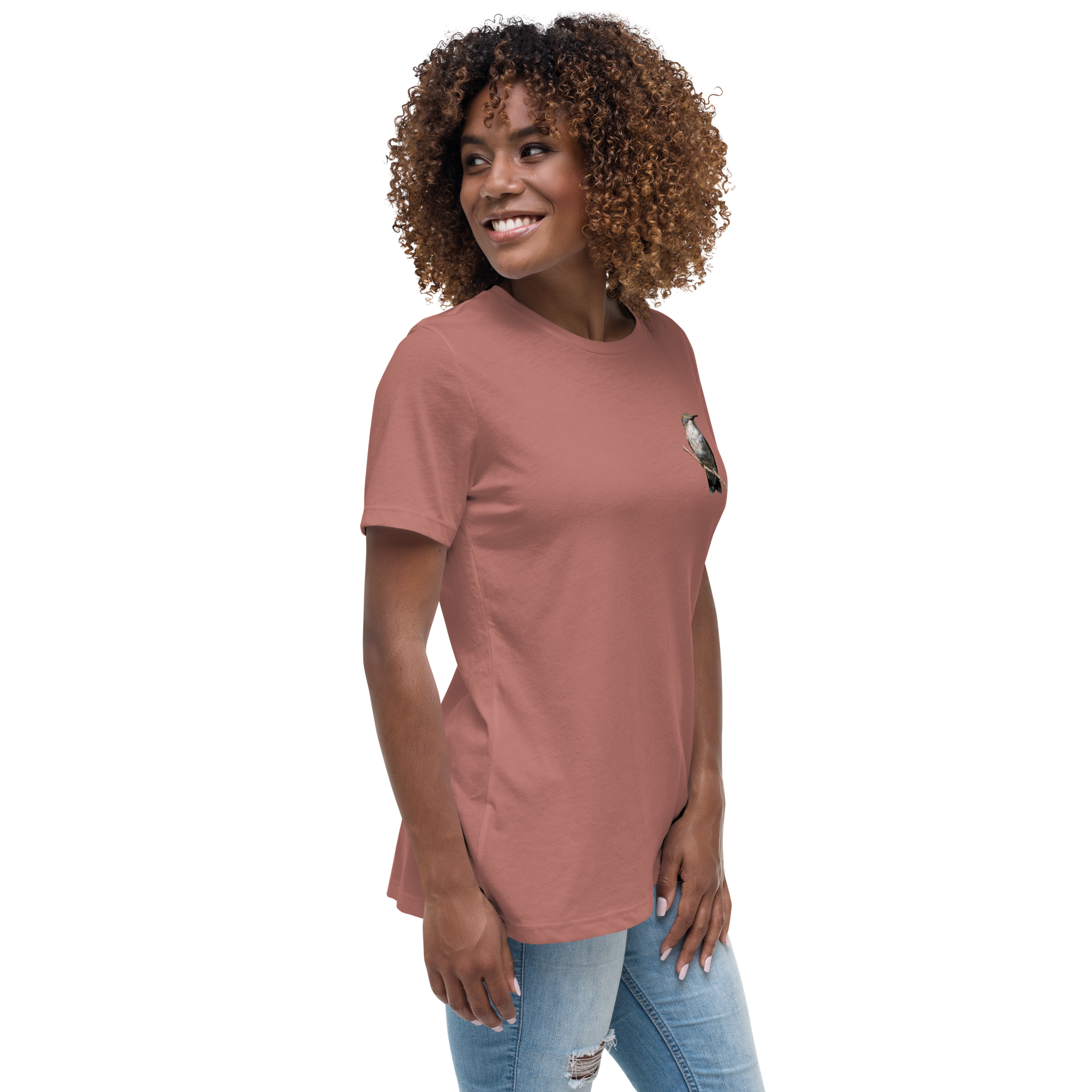 right view of Woman wearing a mauve t-shirt with a hummingbird photo on a branch