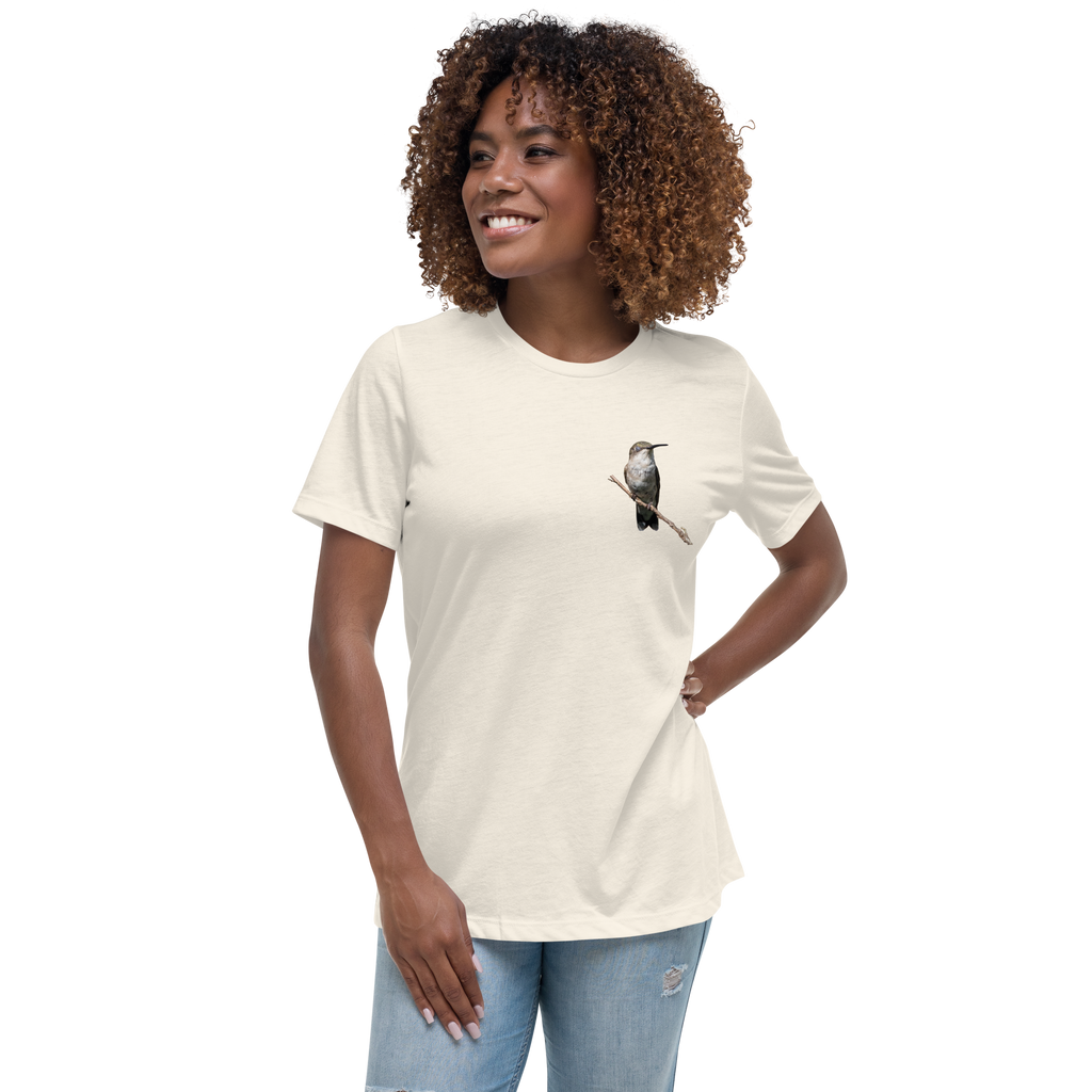 Woman wearing a natural color t-shirt with a hummingbird photo on a branch