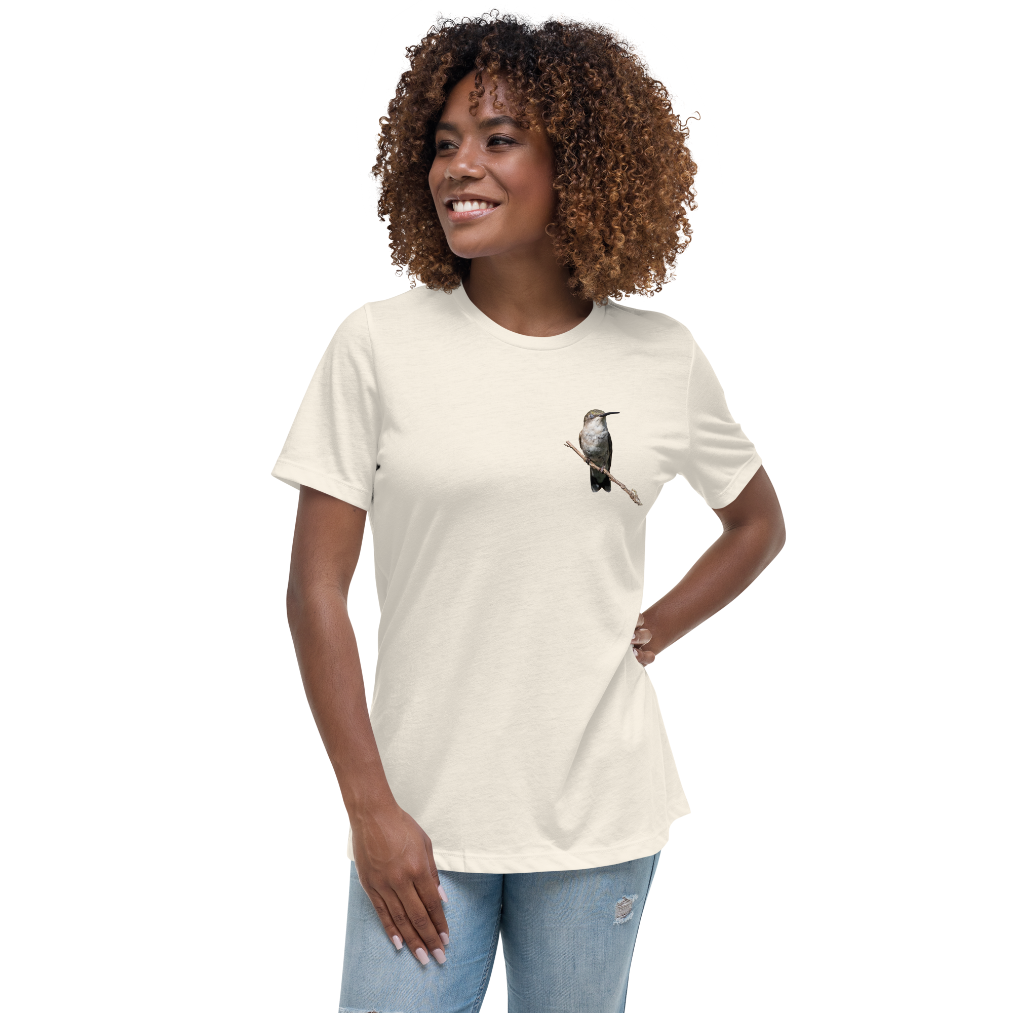 Woman wearing a natural color t-shirt with a hummingbird photo on a branch