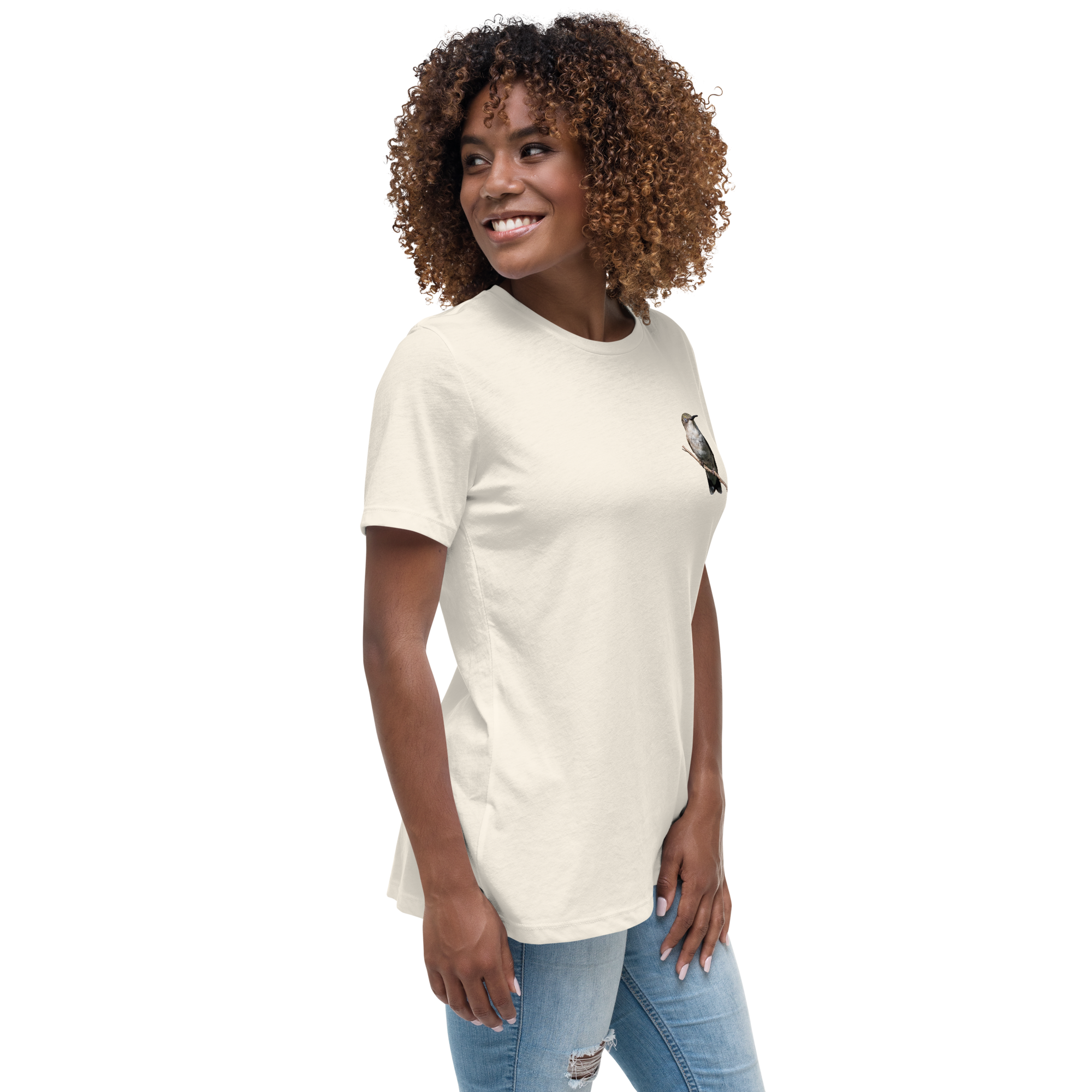 right view of Woman wearing a natural color t-shirt with a hummingbird photo on a branch