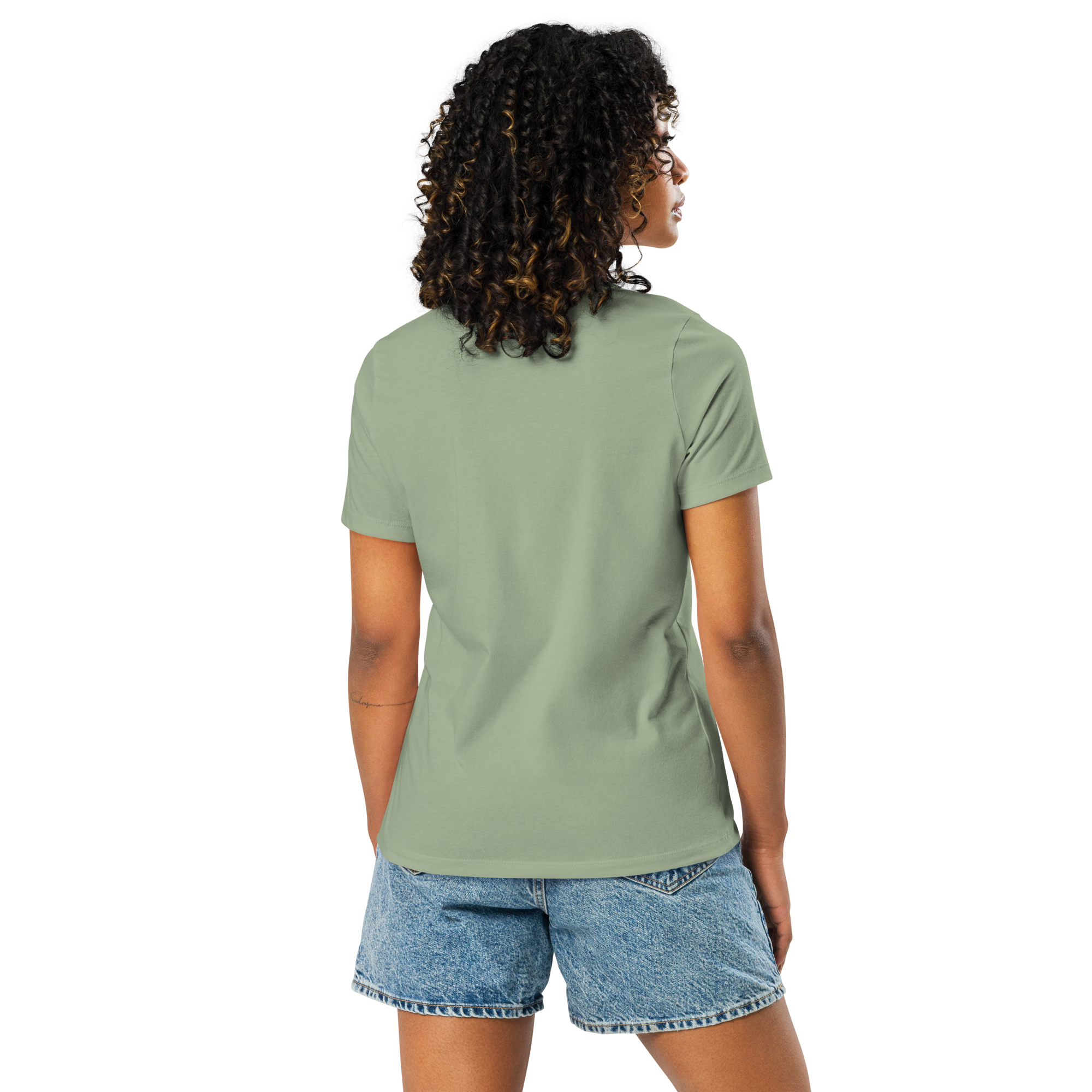back view of Woman wearing sage tee shirt with photo of a hummingbird on the front