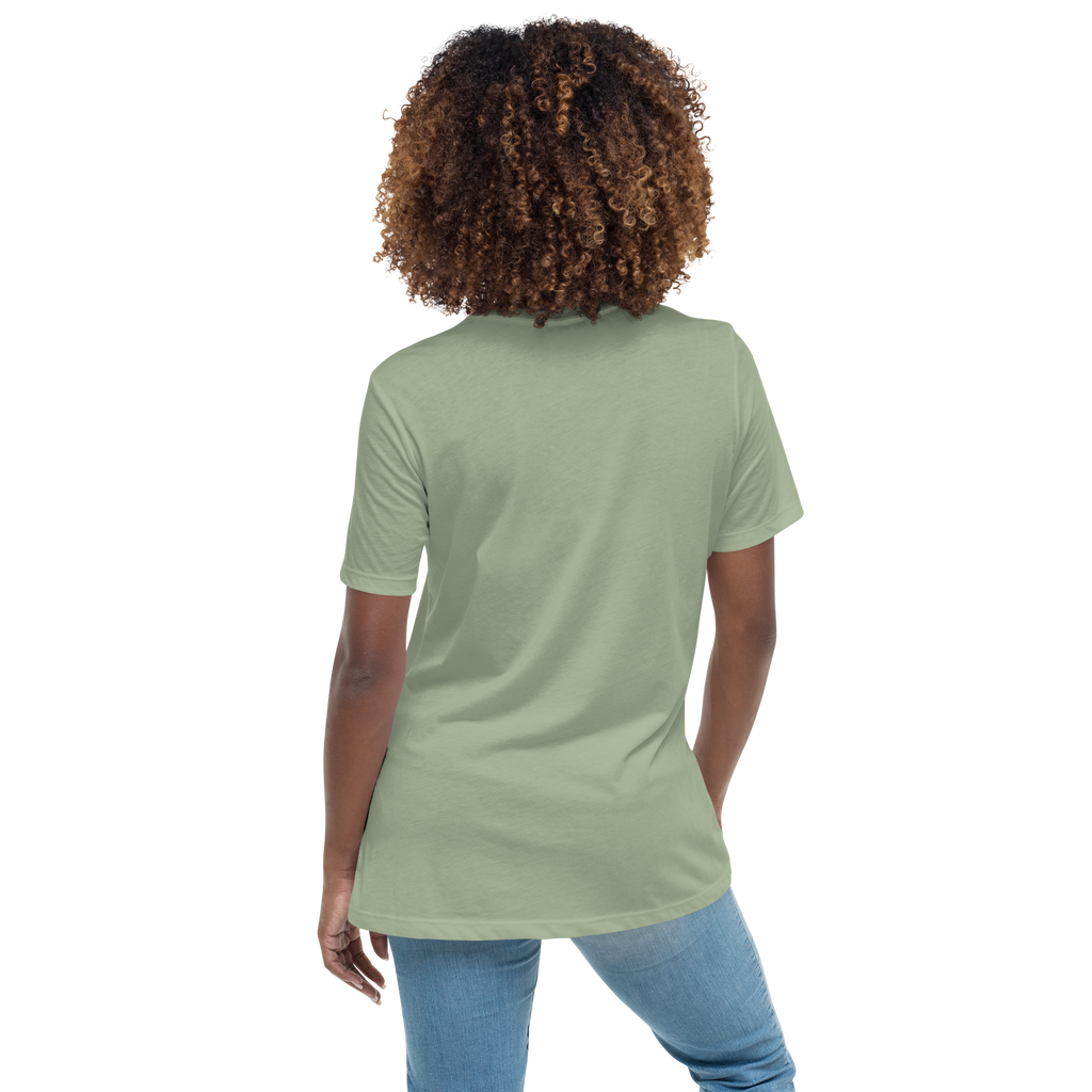 back view of Woman wearing a sage t-shirt with a hummingbird photo on the front
