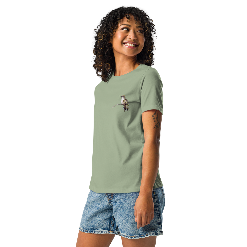 Left view of Woman wearing sage tee shirt with photo of a hummingbird on a branch